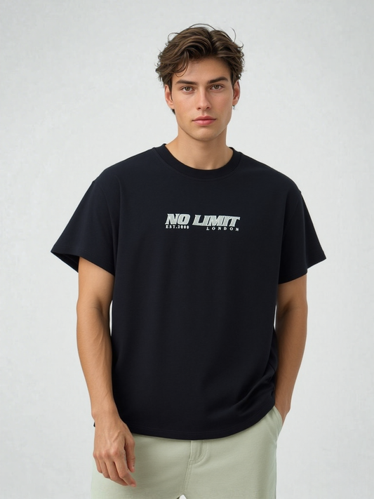 Man wearing a black t-shirt with 'No Limit London text on a white background